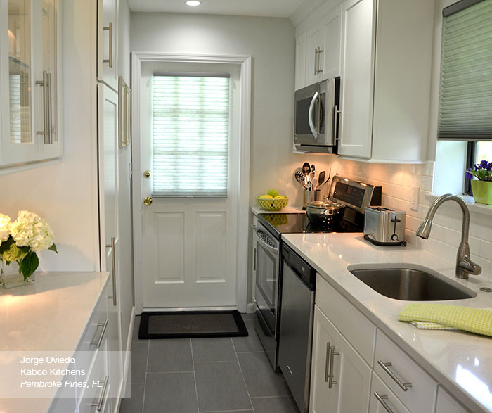 White Sedona Shaker style cabinets in a galley kitchen