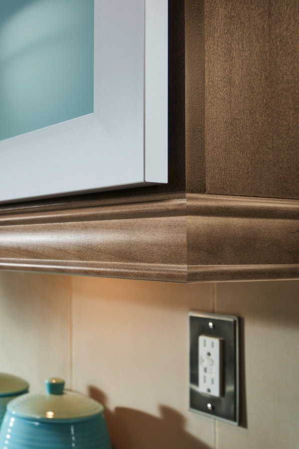 Close-up of light rail moulding on Maple kitchen cabinets